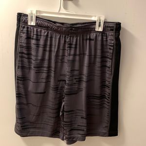 Large gray and black gym shorts